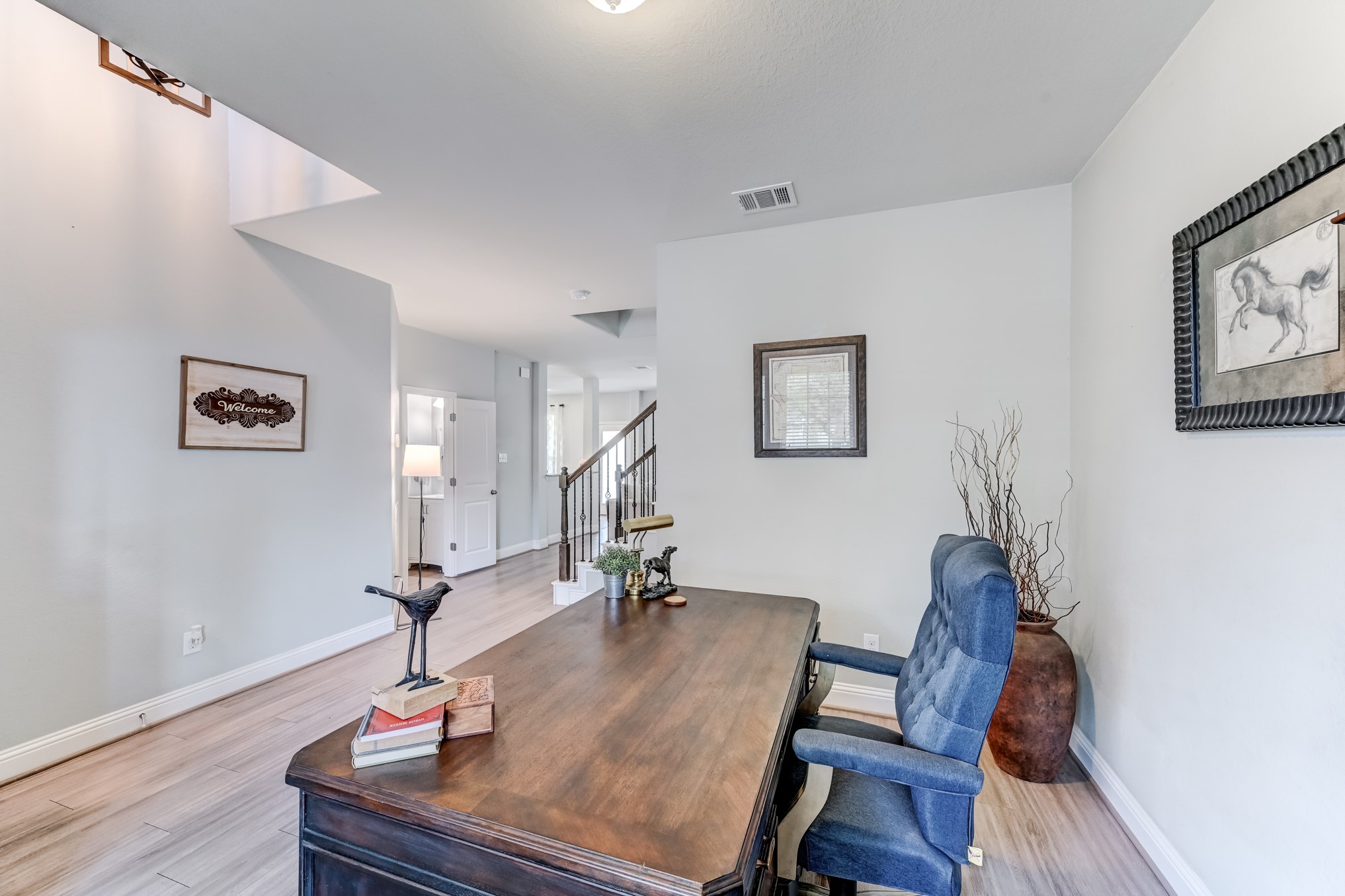 23831 Pennington Hills Drive Spring, TX 77389 - Photo 8 of 46 a room with gym equipment and wooden floor