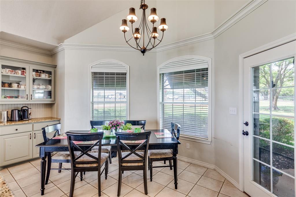 239 Hidden Creek Road Cresson, TX 76035 - Photo 16 of 36 a view of a dining room with furniture window and outside view