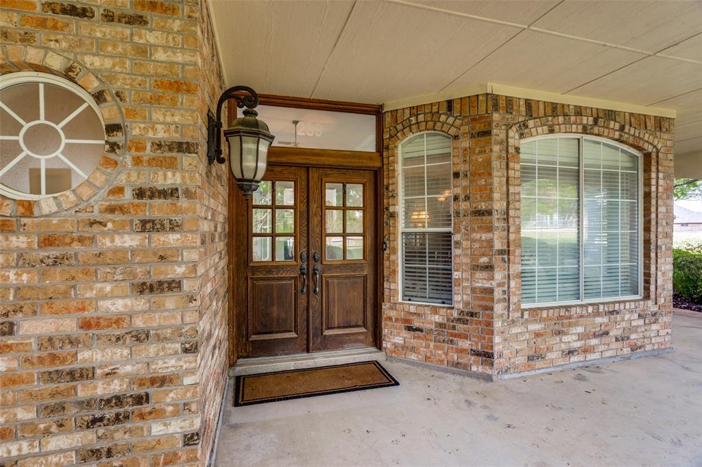 239 Hidden Creek Road Cresson, TX 76035 - Photo 4 of 36 a front view of a building