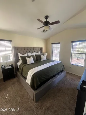 a view of empty room with windows