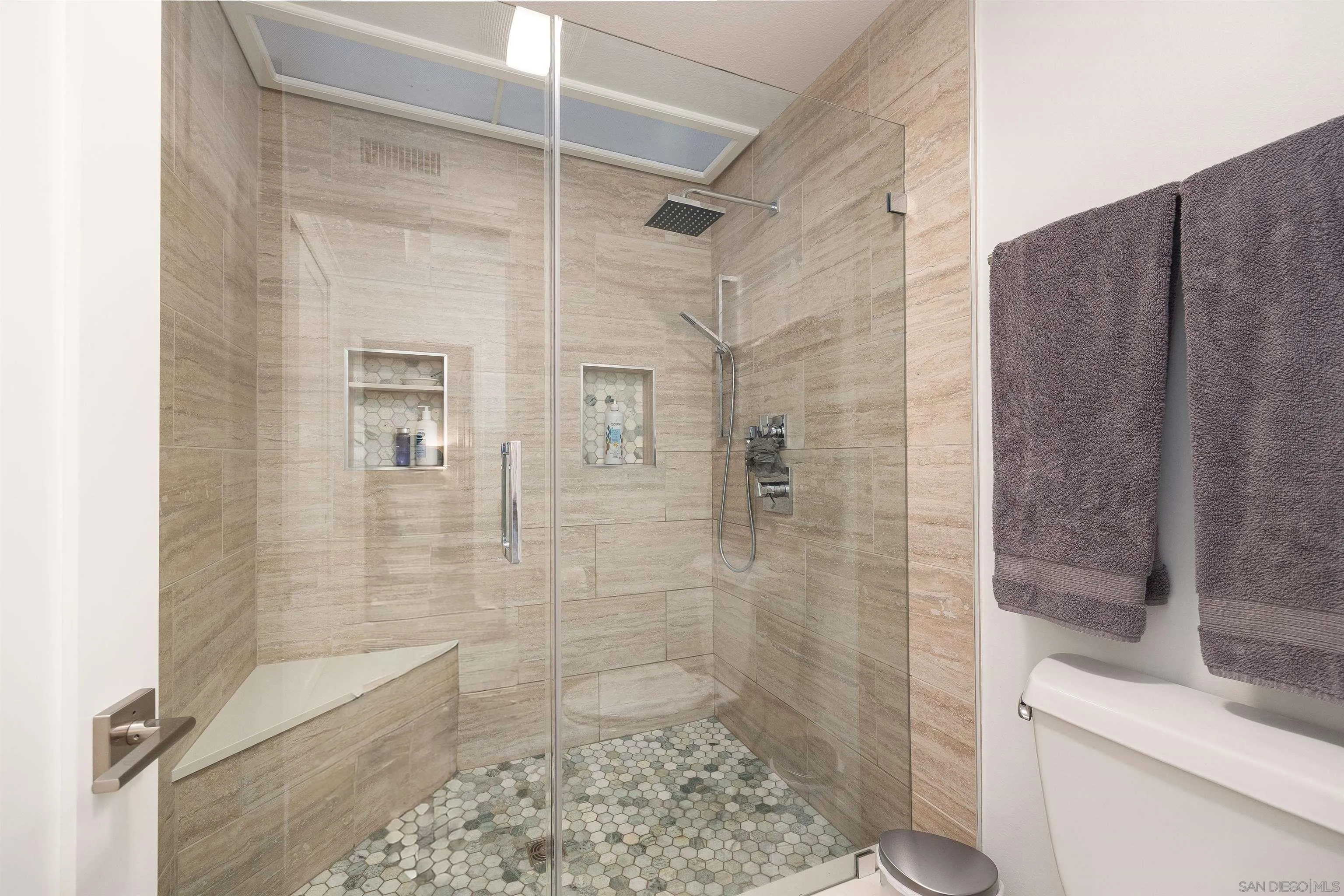 5611 Adobe Falls Road, Unit A San Diego, CA 92120 - Photo 12 of 30 a bathroom with a shower