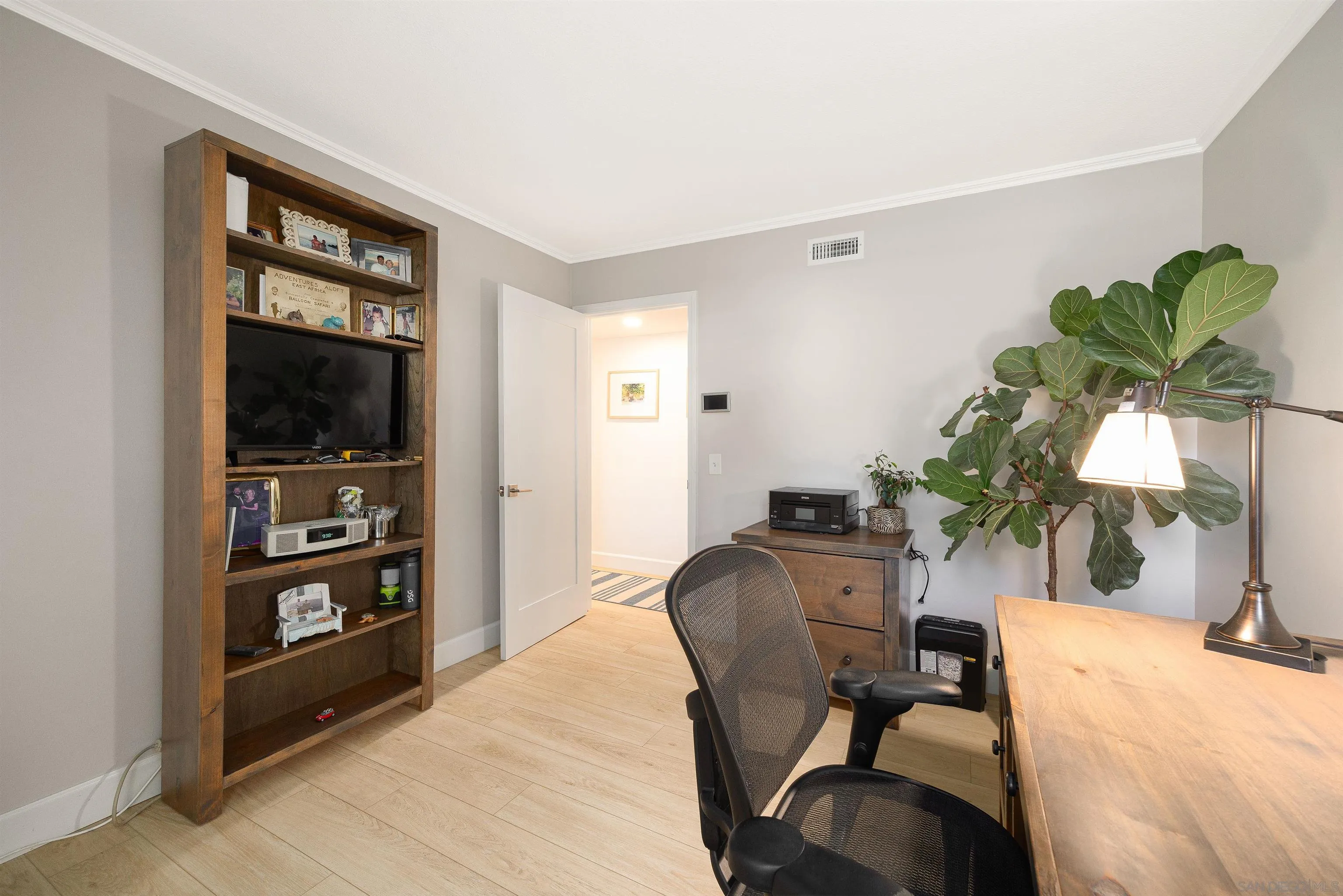 5611 Adobe Falls Road, Unit A San Diego, CA 92120 - Photo 17 of 30 a workspace with furniture and window