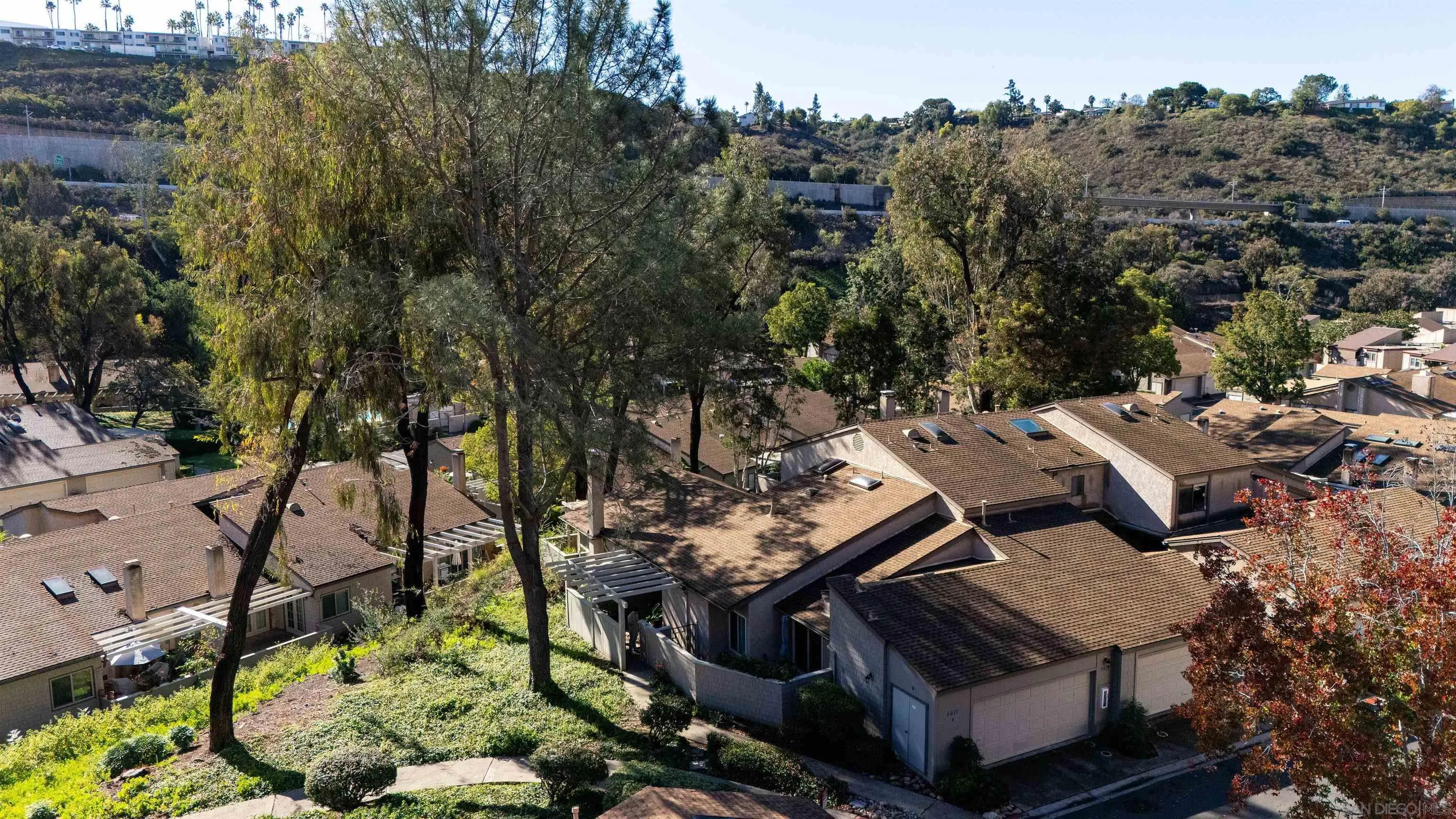 5611 Adobe Falls Road, Unit A San Diego, CA 92120 - Photo 25 of 30 an aerial view of a house with a garden