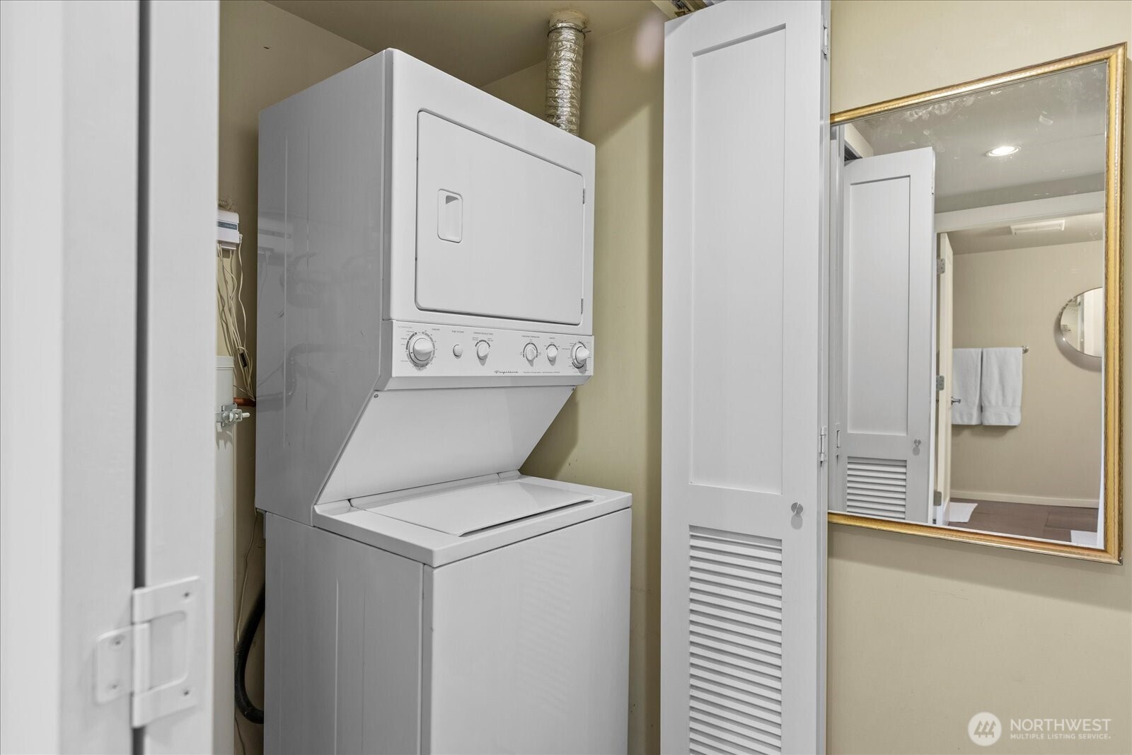 76 Cedar Street, Unit PH07 Seattle, WA 98121 - Photo 21 of 33 a utility room with dryer and washer