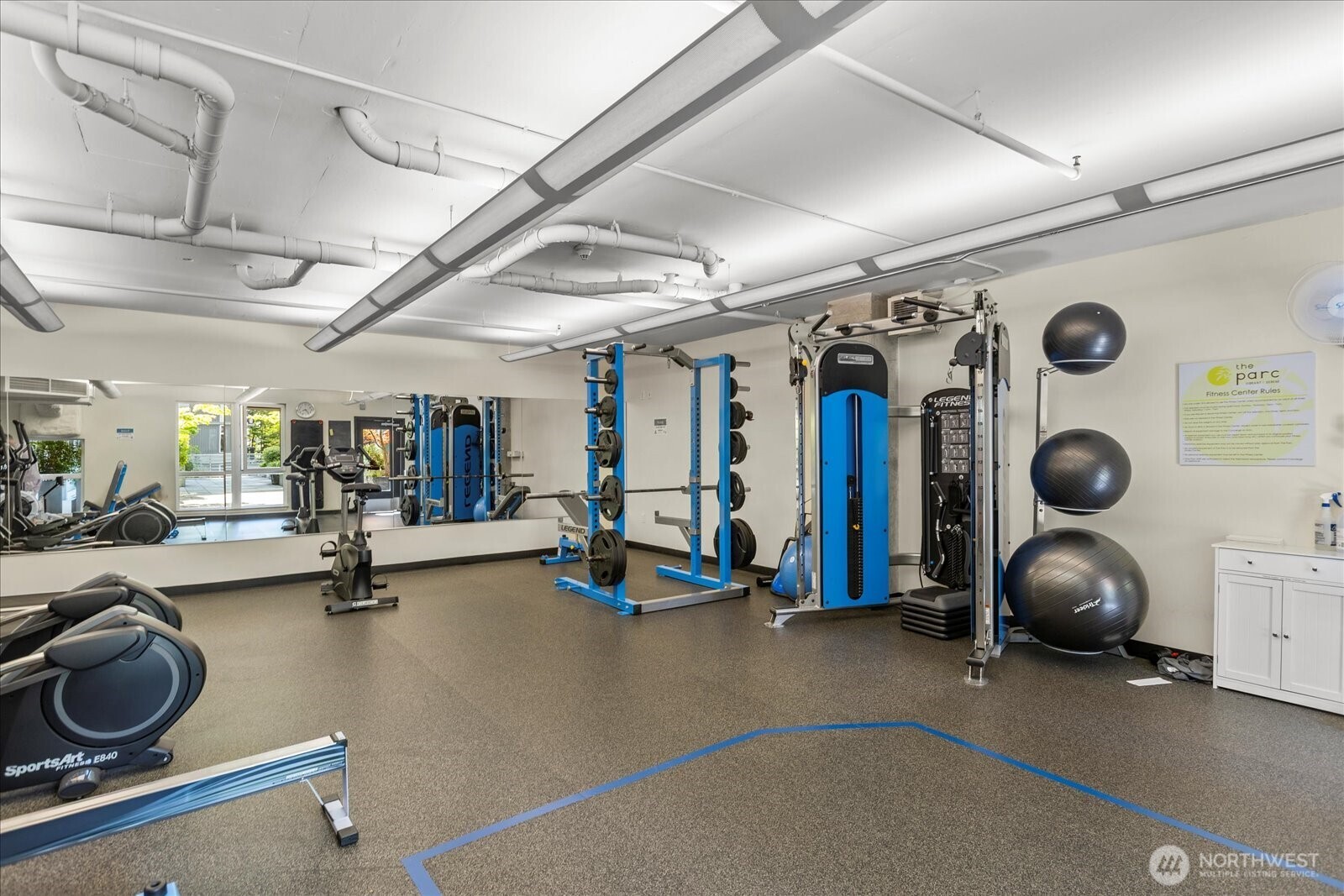 76 Cedar Street, Unit PH07 Seattle, WA 98121 - Photo 27 of 33 a view of a room with gym equipment