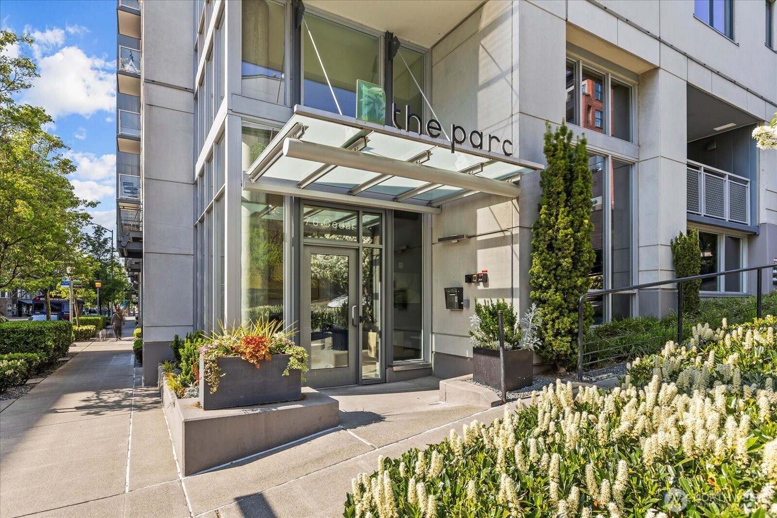 76 Cedar Street, Unit PH07 Seattle, WA 98121 - Photo 3 of 33 a view of a building with potted plants