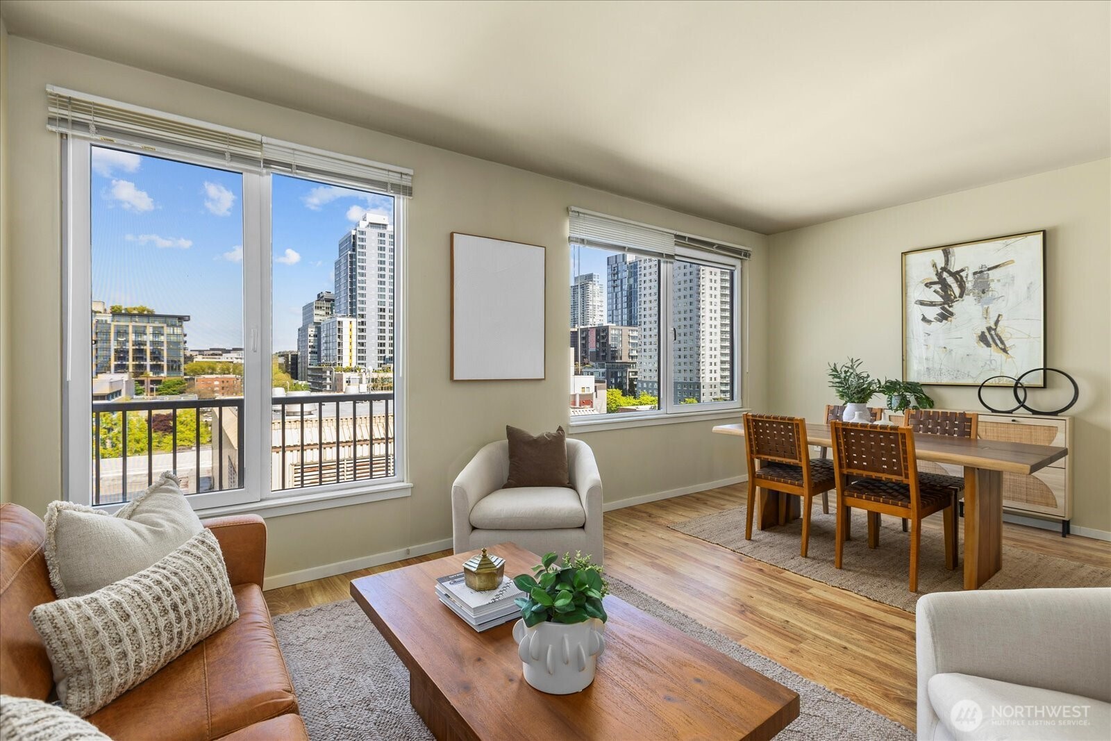 76 Cedar Street, Unit PH07 Seattle, WA 98121 - Photo 6 of 33 a living room with furniture and a large window