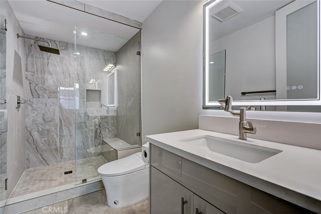 2701 Ruhland Avenue Redondo Beach, CA 90278 - Photo 11 of 38 a bathroom with a sink a toilet and shower