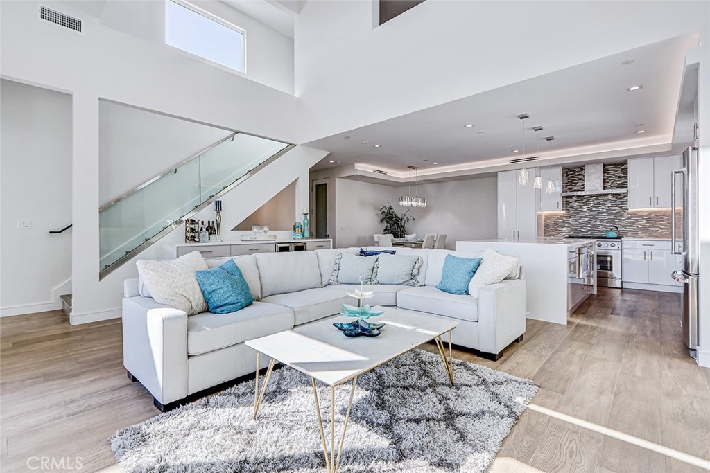 2701 Ruhland Avenue Redondo Beach, CA 90278 - Photo 19 of 38 a living room with furniture and wooden floor