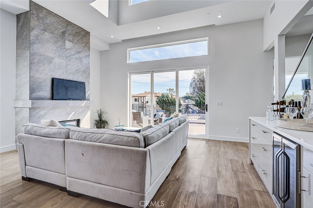 2701 Ruhland Avenue Redondo Beach, CA 90278 - Photo 20 of 38 a living room with furniture and a fireplace