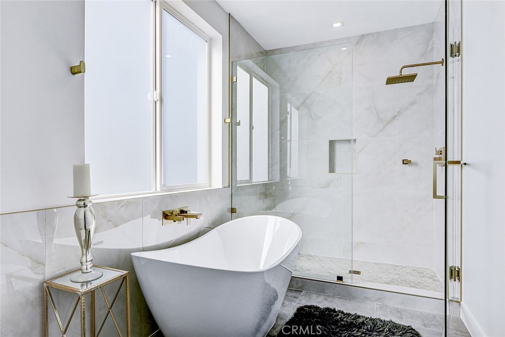 2701 Ruhland Avenue Redondo Beach, CA 90278 - Photo 30 of 38 a bathroom with a bathtub and shower