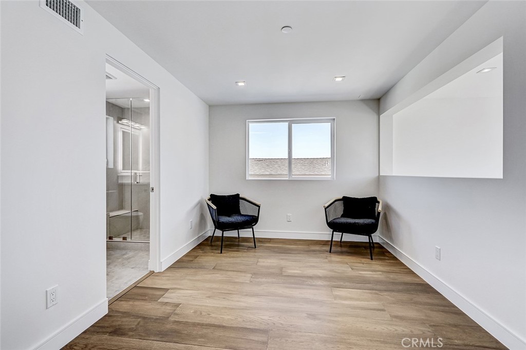 2701 Ruhland Avenue Redondo Beach, CA 90278 - Photo 37 of 38 a living room with furniture and a gate