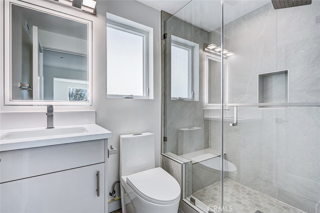 2701 Ruhland Avenue Redondo Beach, CA 90278 - Photo 38 of 38 a bathroom with a toilet a sink and shower