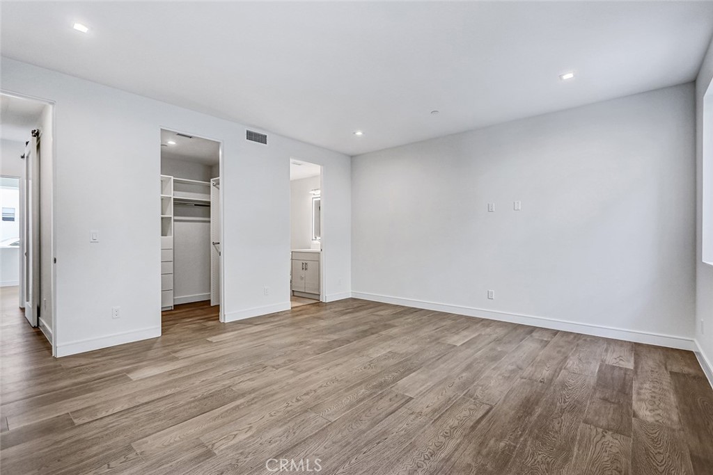 2701 Ruhland Avenue Redondo Beach, CA 90278 - Photo 10 of 38 a view of an empty room with wooden floor and closet