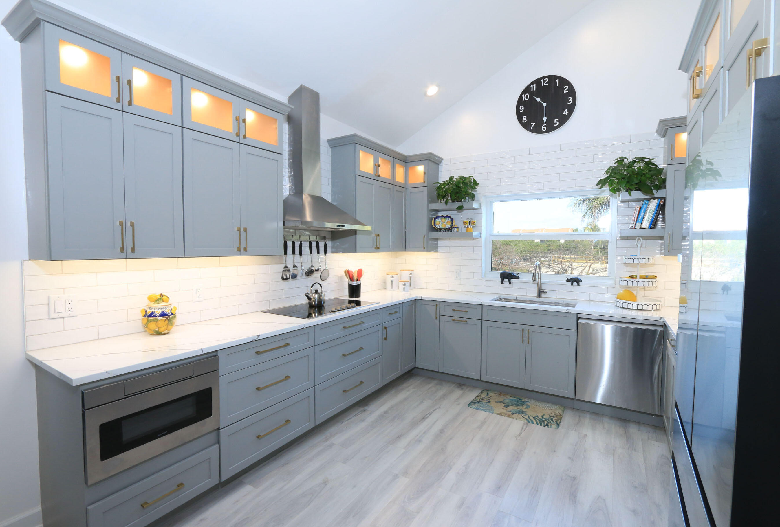 4161 U.S. Highway 1, Unit E3 Jupiter, FL 33477 - Photo 20 of 86 a kitchen with counter top space and cabinets