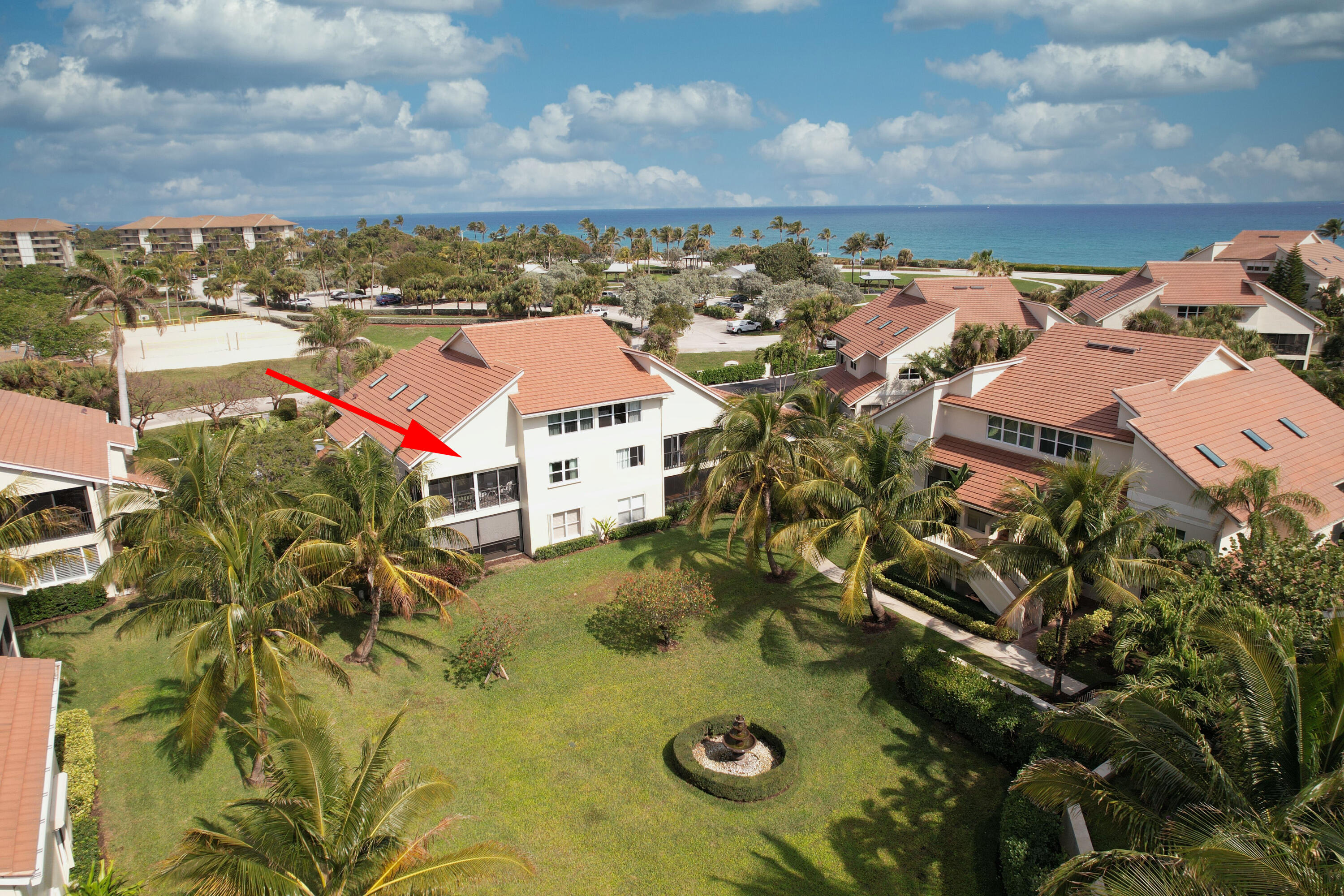4161 U.S. Highway 1, Unit E3 Jupiter, FL 33477 - Photo 3 of 86 an aerial view of a house with a swimming pool