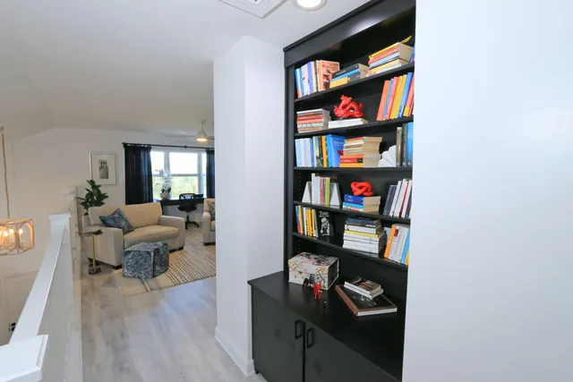 an aerial view of a house with a garden