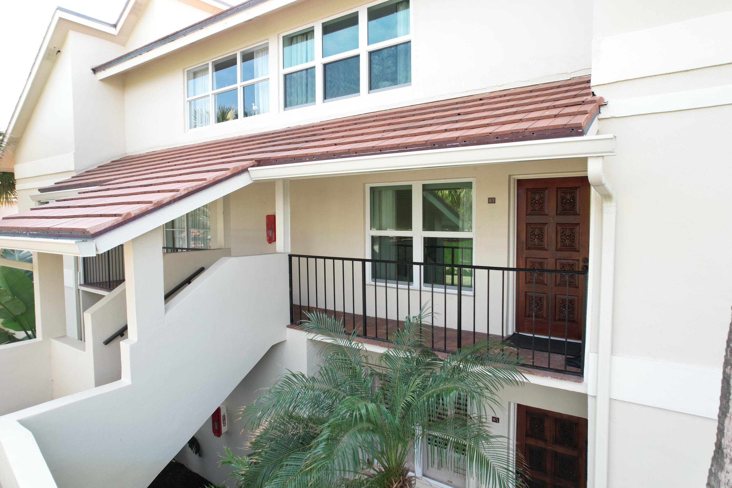 4161 U.S. Highway 1, Unit E3 Jupiter, FL 33477 - Photo 5 of 86 a view of a house with a window and wooden floor