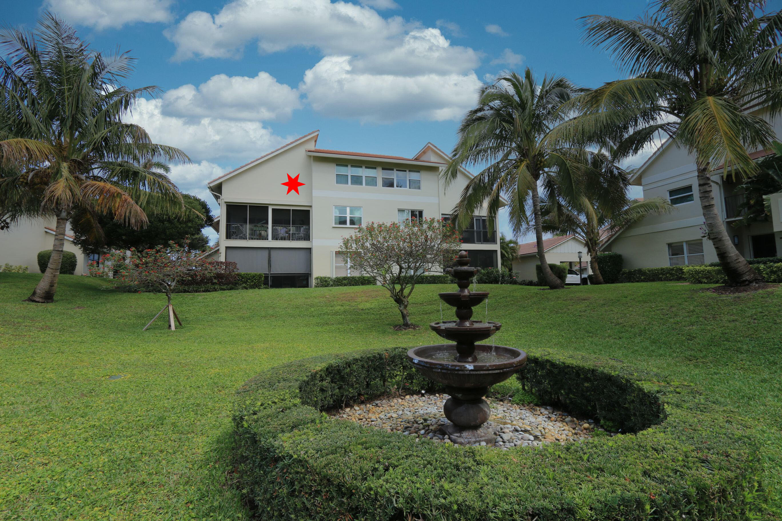 4161 U.S. Highway 1, Unit E3 Jupiter, FL 33477 - Photo 55 of 86 a house with garden in front of it