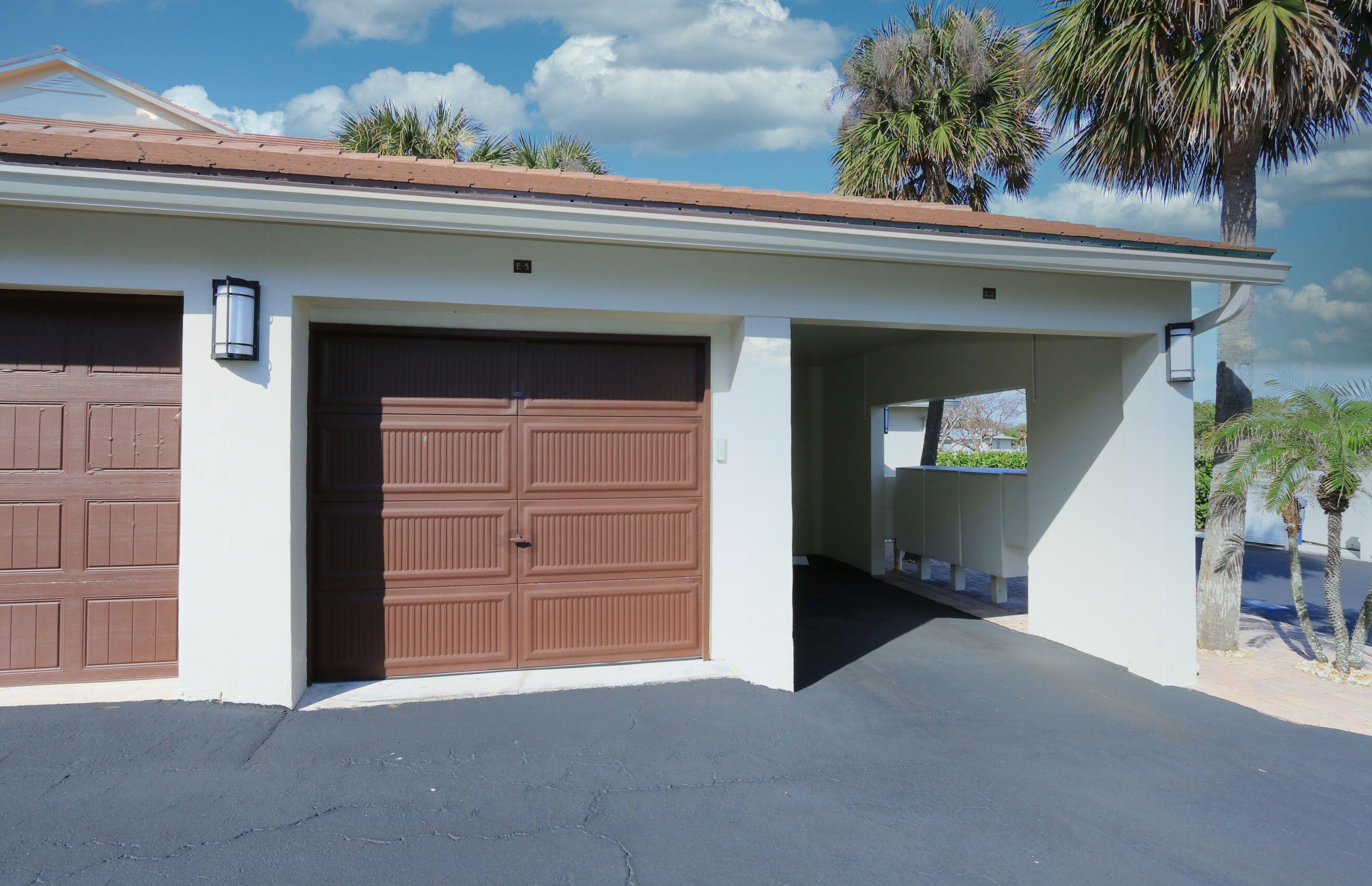 4161 U.S. Highway 1, Unit E3 Jupiter, FL 33477 - Photo 59 of 86 front view of a house with a yard