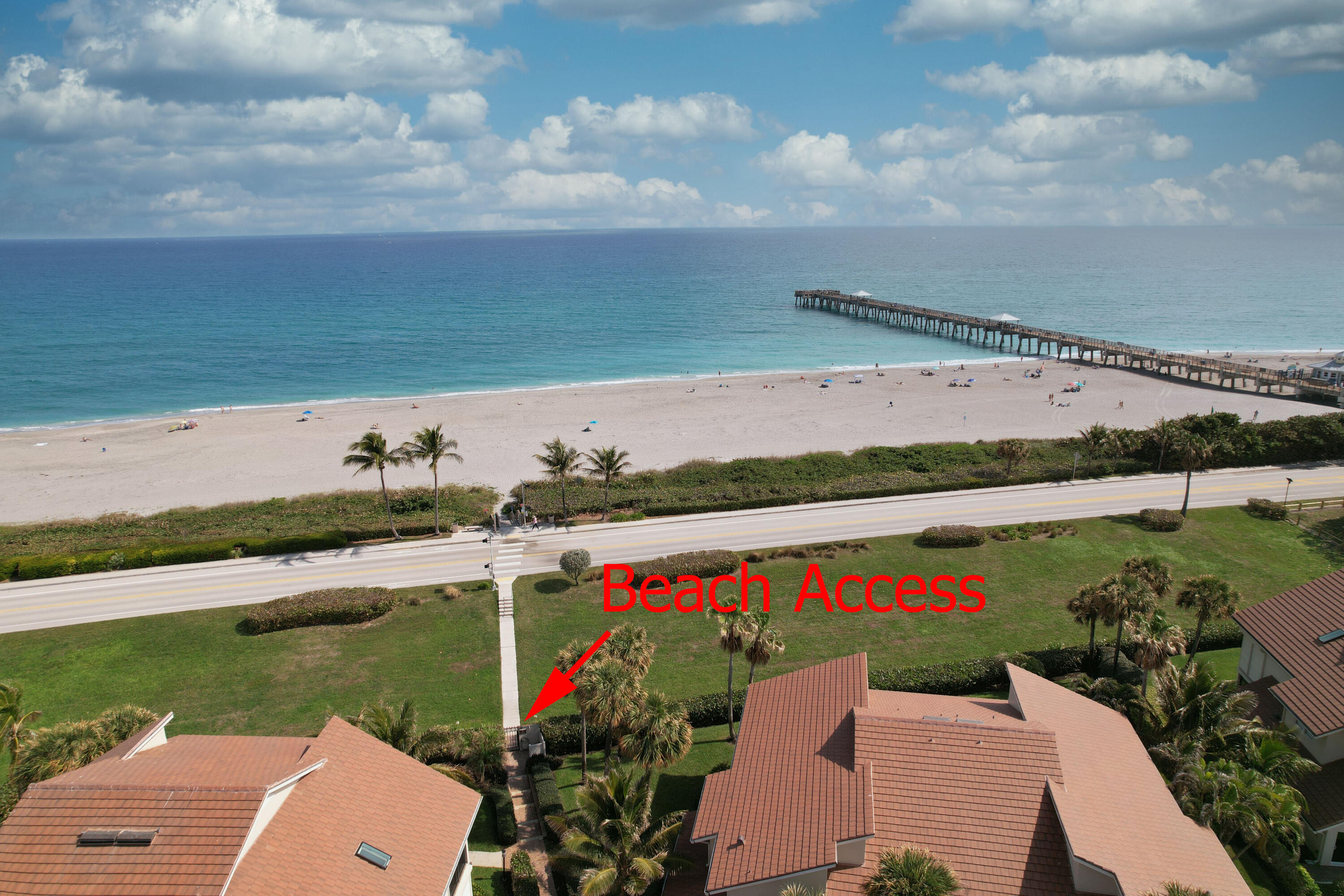 4161 U.S. Highway 1, Unit E3 Jupiter, FL 33477 - Photo 77 of 86 an aerial view of a house with a garden