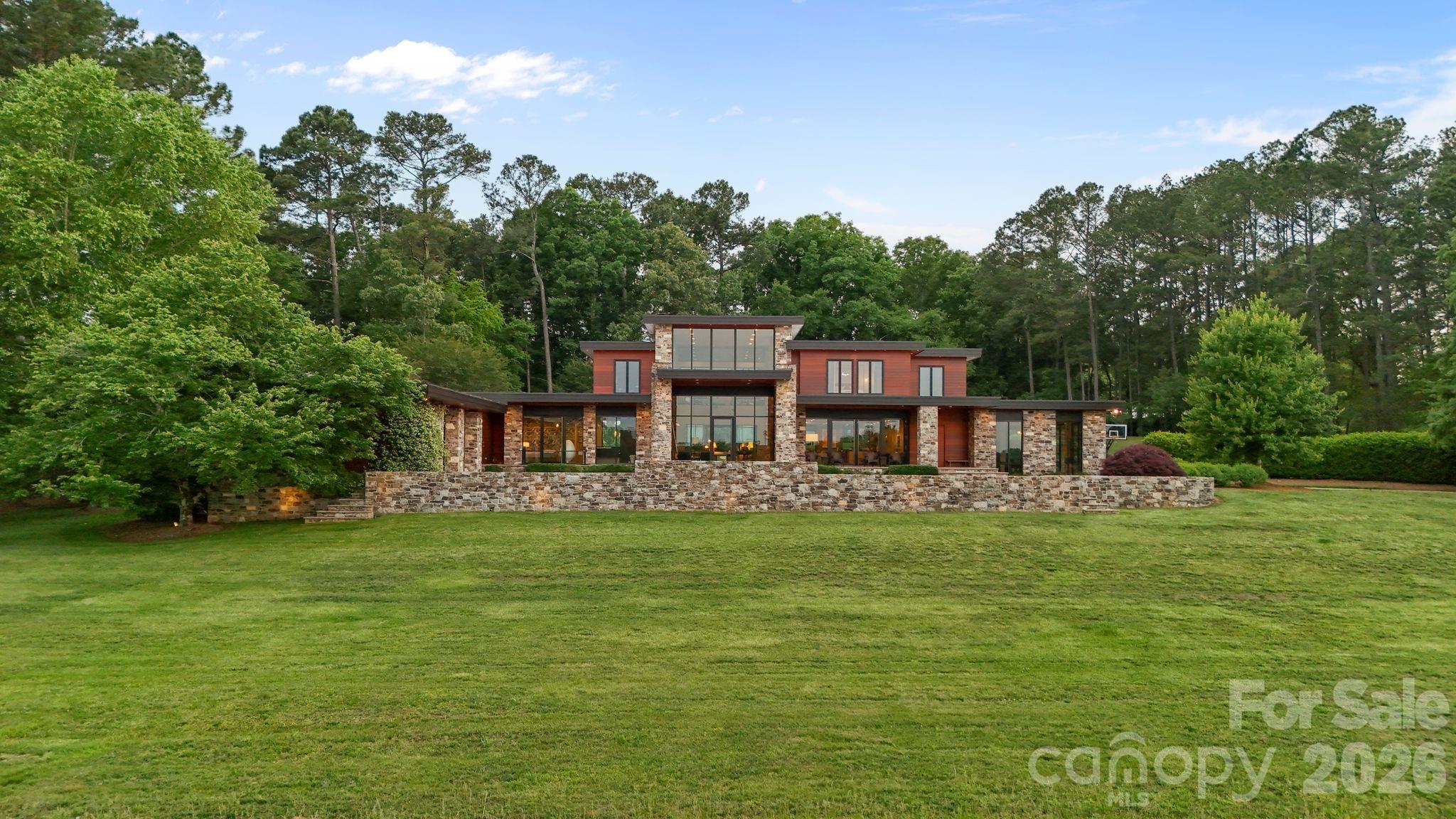1795 Faires Road Rock Hill, SC 29730 - Photo 1 of 48 a view of a house with a big yard potted plants and large tree