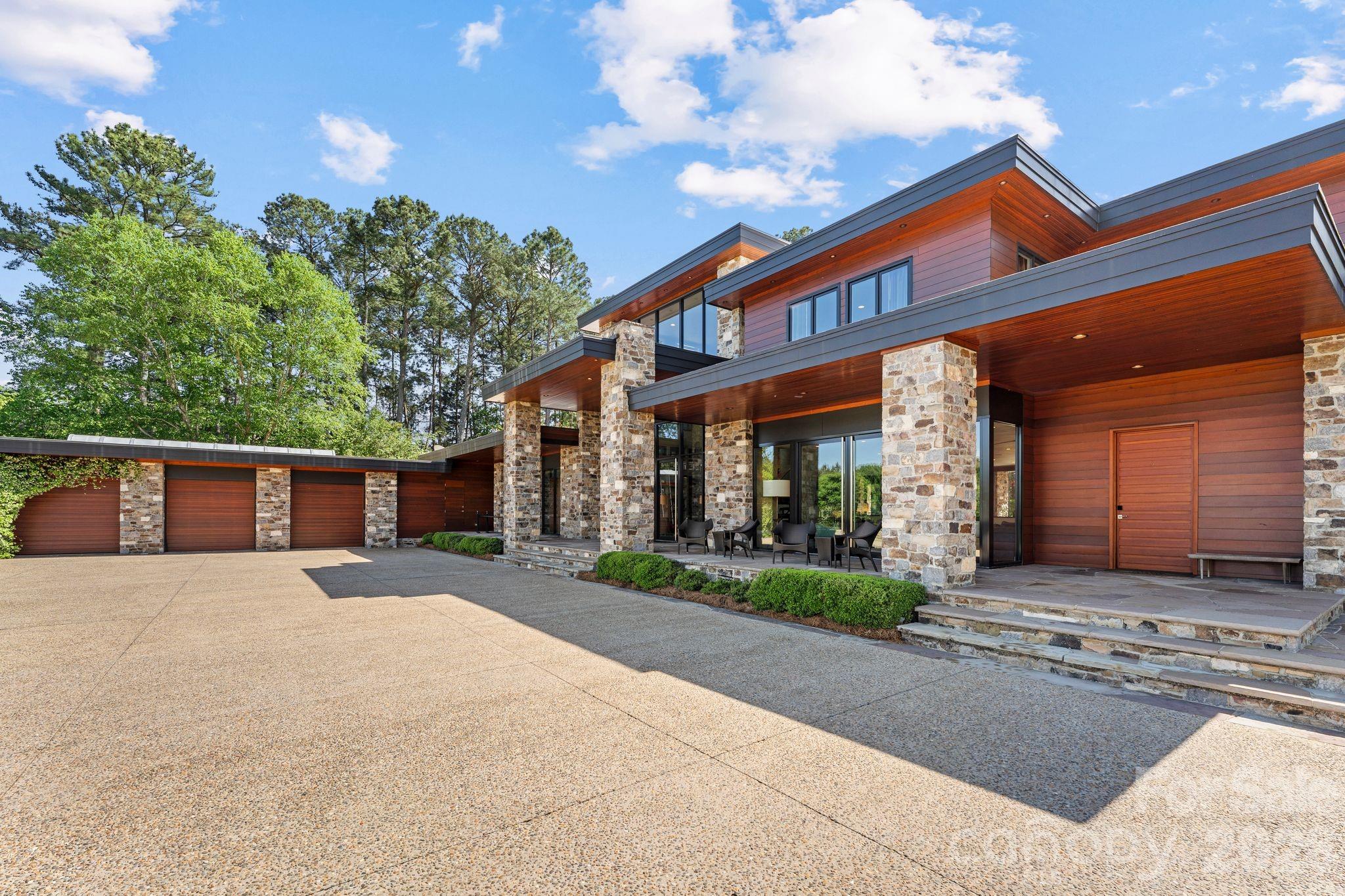 1795 Faires Road Rock Hill, SC 29730 - Photo 3 of 48 a front view of a house with a yard and garage