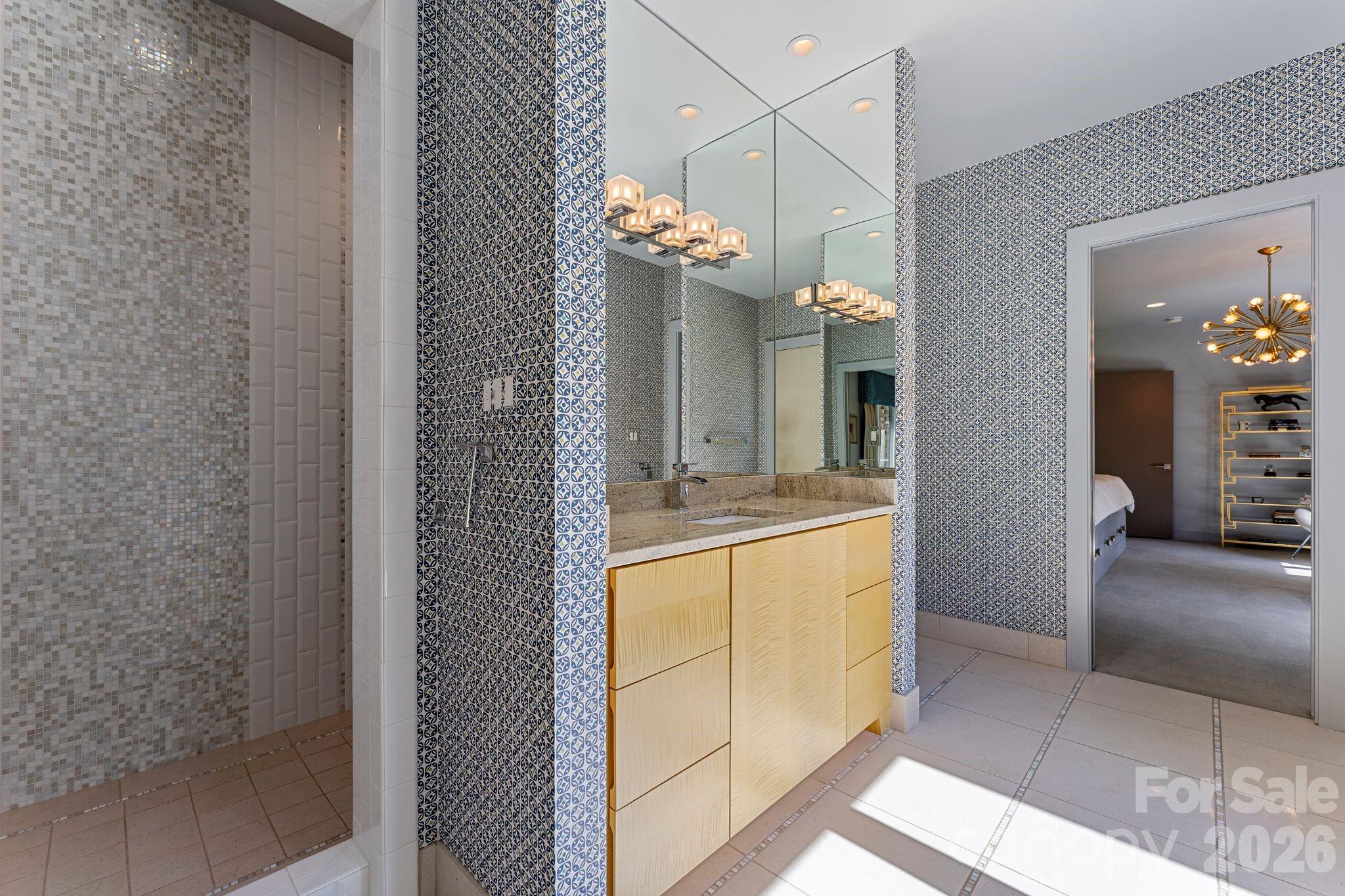 1795 Faires Road Rock Hill, SC 29730 - Photo 35 of 48 a bathroom with a granite countertop sink a mirror and a shower