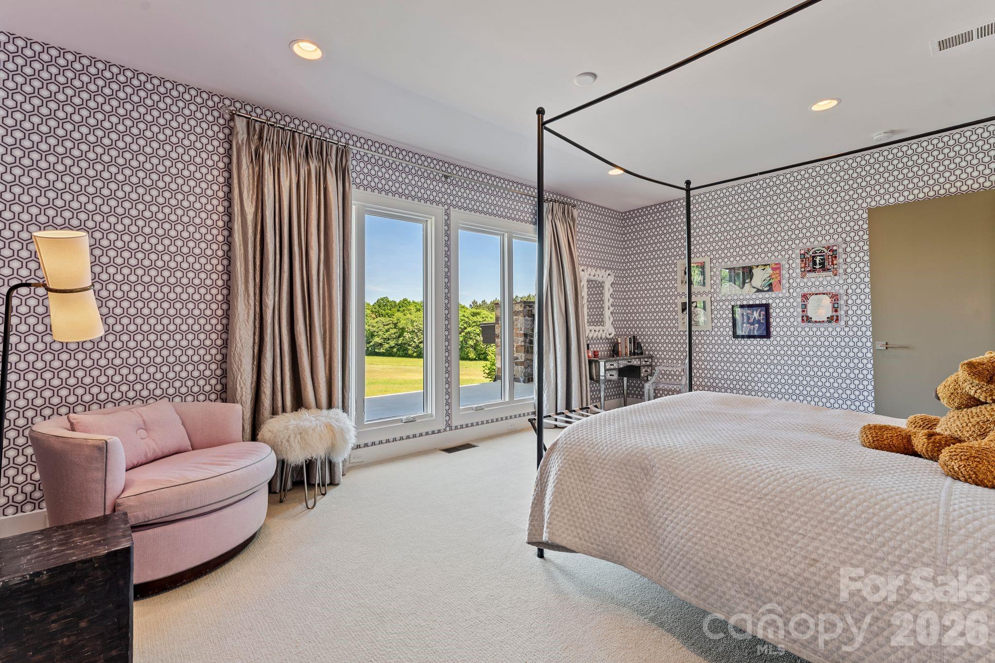 1795 Faires Road Rock Hill, SC 29730 - Photo 38 of 48 a spacious bedroom with a bed and a couch