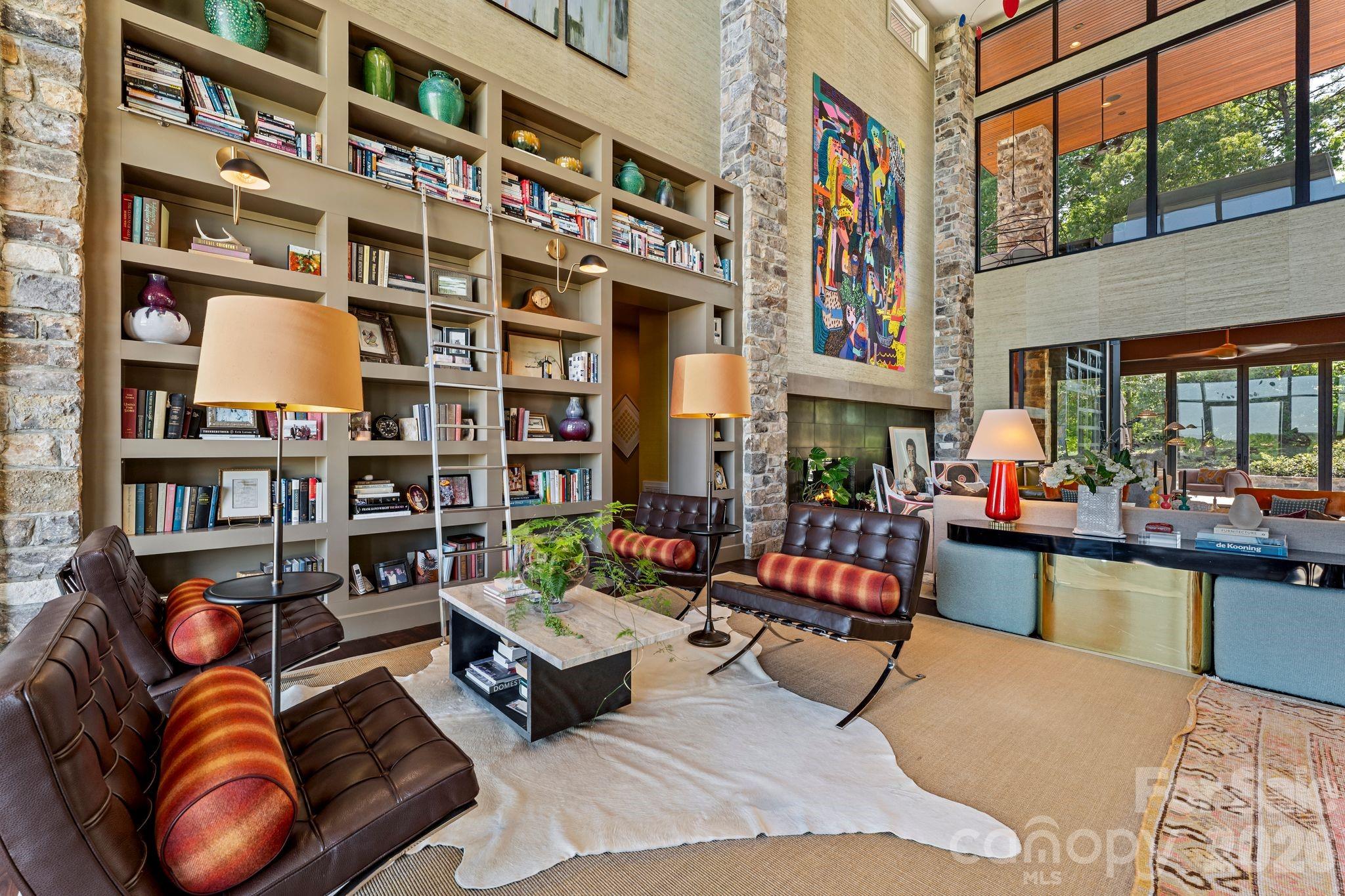 1795 Faires Road Rock Hill, SC 29730 - Photo 10 of 48 a living room with fireplace furniture and a book shelf