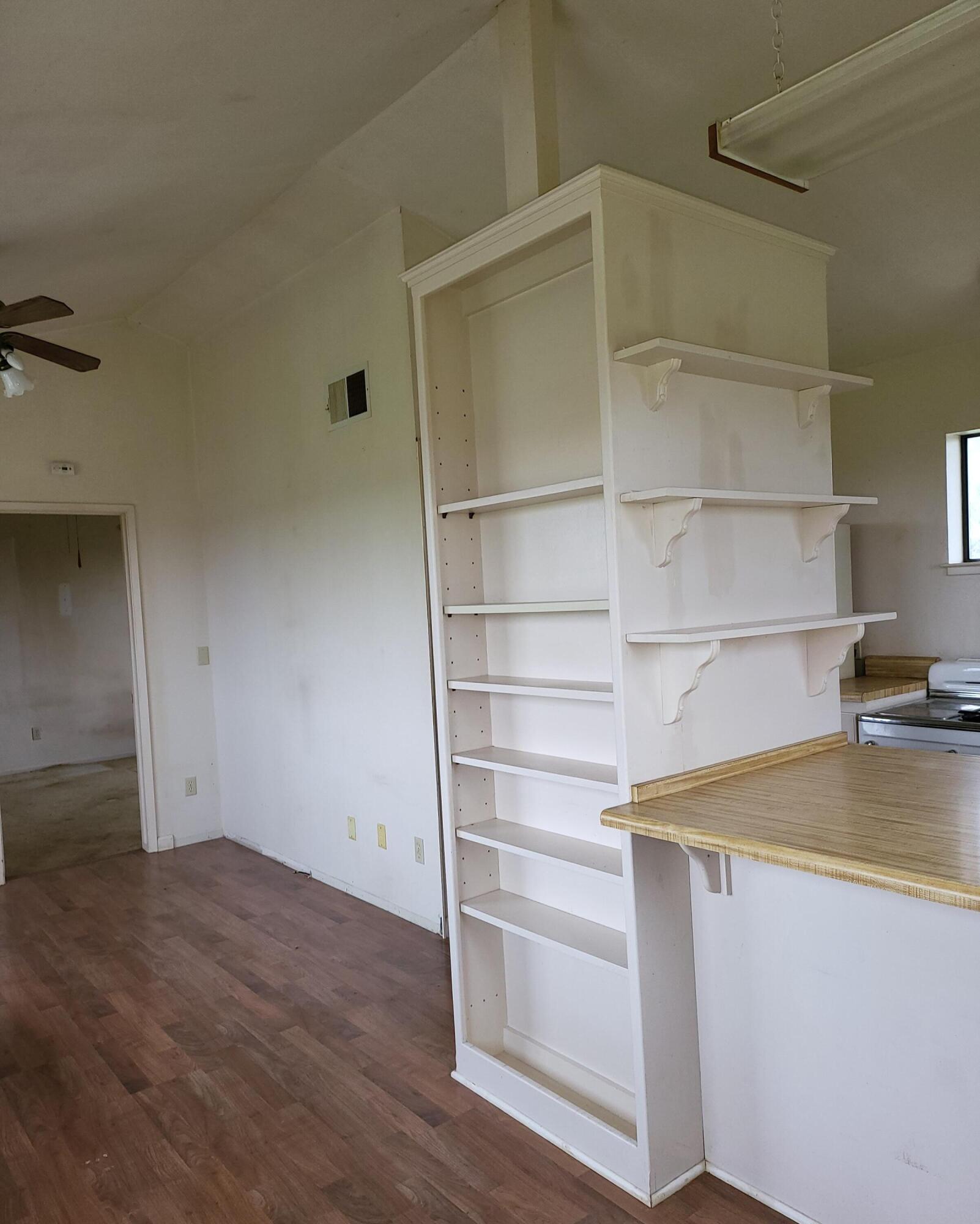 19009 Paskenta Road Corning, CA 96021 - Photo 13 of 33 a view of walk in closet with empty racks