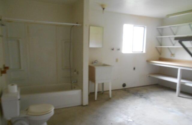 19009 Paskenta Road Corning, CA 96021 - Photo 25 of 33 a bathroom with a toilet and a shower