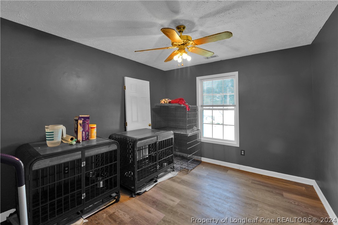 229 Lakeside Road Raeford, NC 28376 - Photo 15 of 17 a bedroom with furniture and window