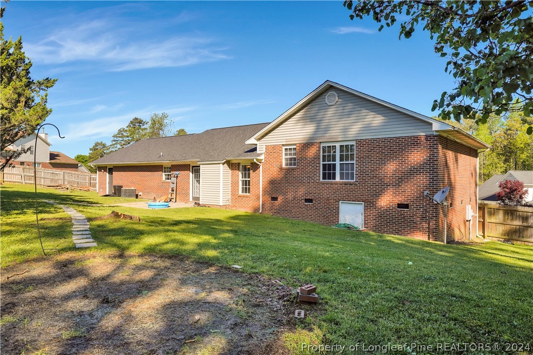 229 Lakeside Road Raeford, NC 28376 - Photo 17 of 17 a front view of a house with a yard