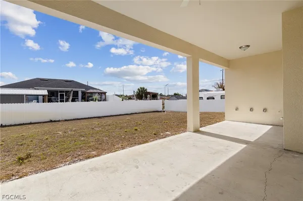 a view of pool with yard