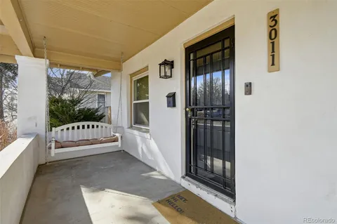 a view of a livingroom with furniture and window
