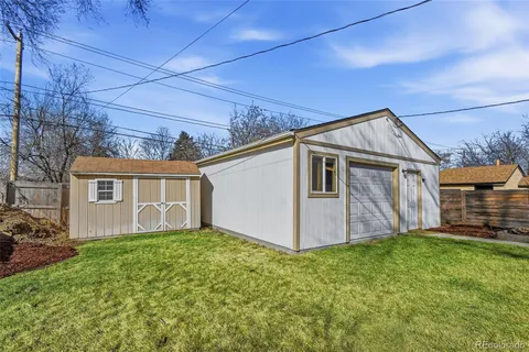 a view of a room with wooden walls