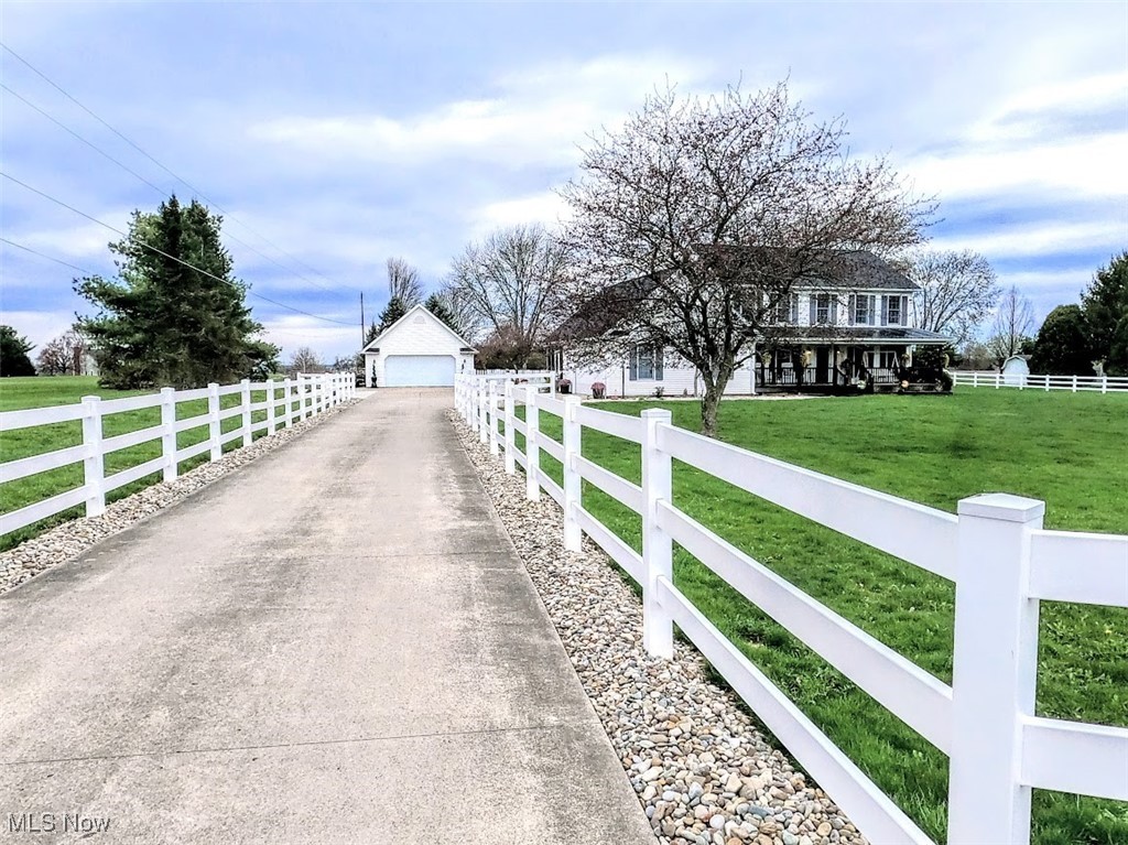 2421 McCoy Road Wooster, OH 44691 - Photo 33 of 39 View of street with a rural view and driveway