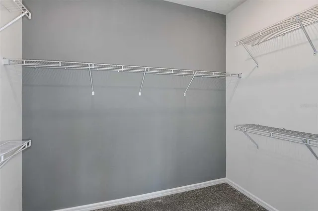 a view of a room with racks on the wall