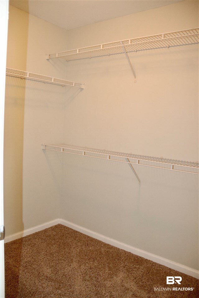 1517 Regency Road, Unit 122 Gulf Shores, AL 36542 - Photo 30 of 37 Master Walk-in Closet