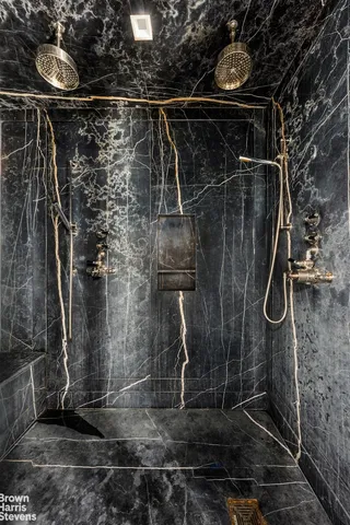 a bathroom with a large window and a sink