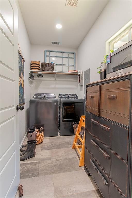 280 Lanier Road Combine, TX 75159 - Photo 19 of 36 a storage room with washer and dryer