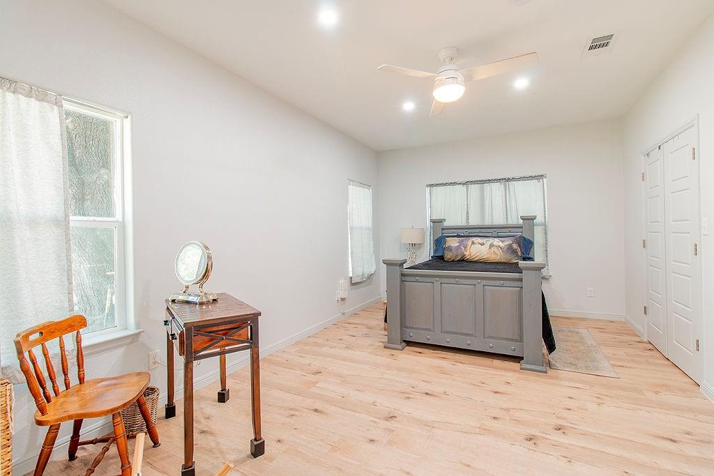 280 Lanier Road Combine, TX 75159 - Photo 20 of 36 a kitchen with sink cabinets and wooden floor