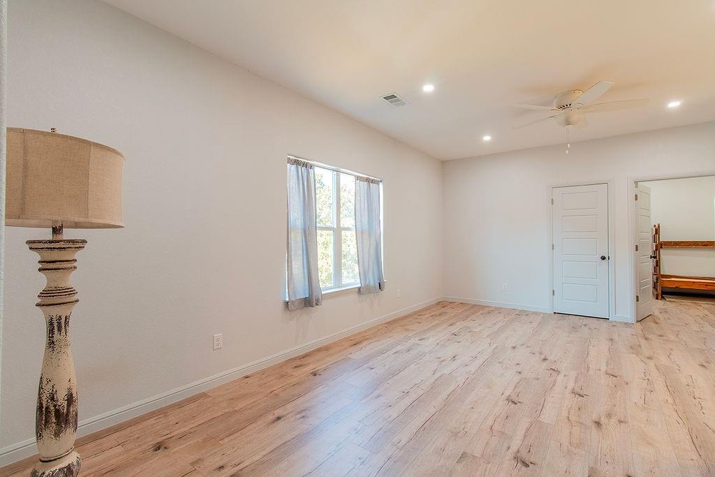 280 Lanier Road Combine, TX 75159 - Photo 30 of 36 a view of a livingroom with wooden floor and window