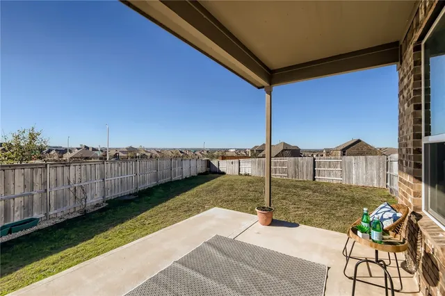 a view of a balcony with an outdoor space