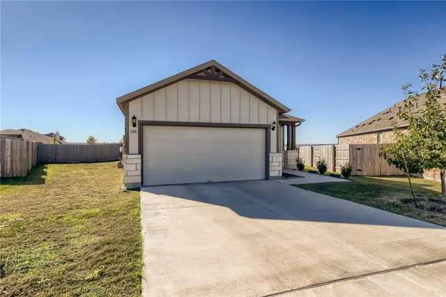 a view of backyard of house
