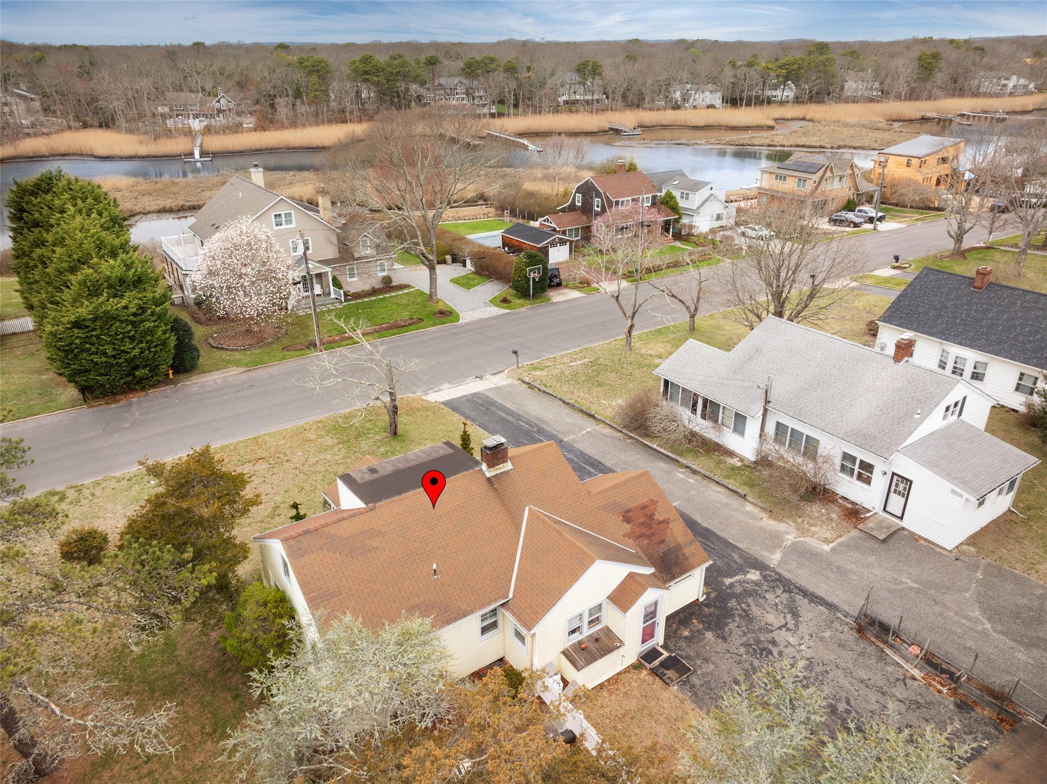 12 Bishop Avenue Westhampton, NY 11977 - Photo 1 of 1 an aerial view of residential houses with outdoor space