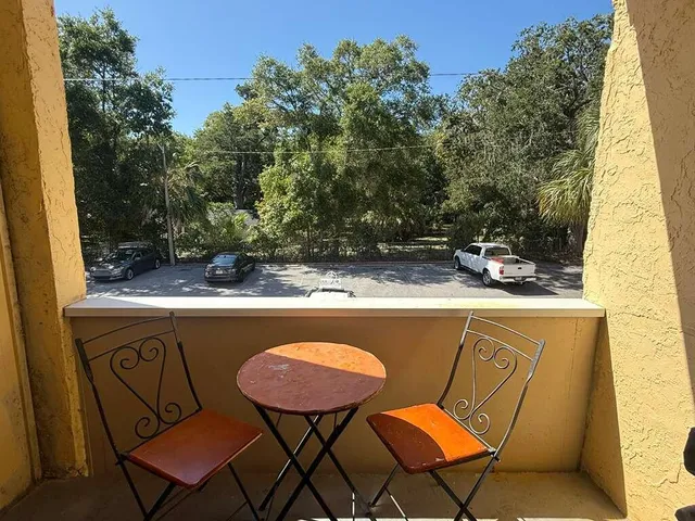 a view of a kitchen with sink washer and dryer