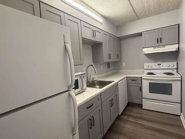 a room with a chair and a window