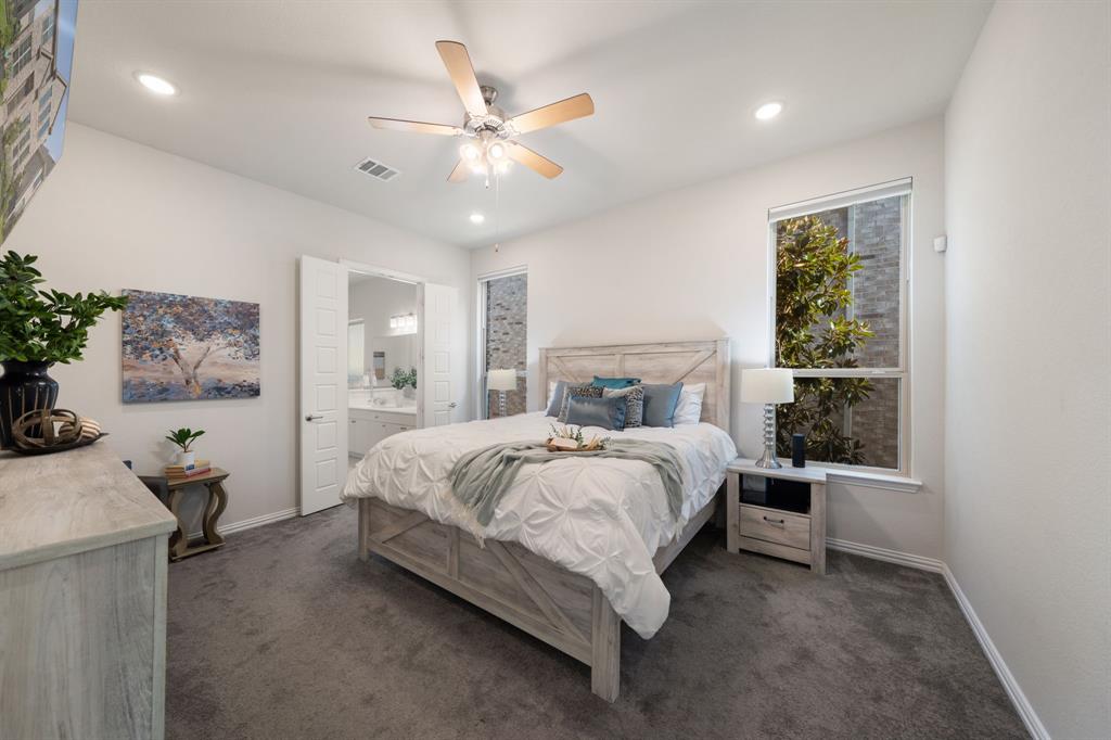 744 Patriot Lane Irving, TX 75060 - Photo 17 of 40 a bedroom with a bed and window